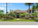 Two-story house with palm trees and well-maintained landscaping at 3548 Tuscany Reserve Blvd, New Smyrna Beach, FL 32168