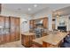Modern kitchen with granite countertops and stainless steel appliances at 3548 Tuscany Reserve Blvd, New Smyrna Beach, FL 32168