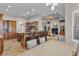 Open kitchen with large island and granite countertops at 3548 Tuscany Reserve Blvd, New Smyrna Beach, FL 32168