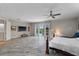 Spacious main bedroom with wood floors and access to the backyard at 3548 Tuscany Reserve Blvd, New Smyrna Beach, FL 32168
