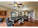 Relaxing media room featuring a large sectional sofa and built-in wet bar at 3548 Tuscany Reserve Blvd, New Smyrna Beach, FL 32168