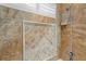 Shower with decorative tile and built-in shelf at 3548 Tuscany Reserve Blvd, New Smyrna Beach, FL 32168