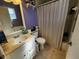 Clean bathroom with single sink vanity, toilet and shower bathtub at 3566 Red Pontiac Dr, Port Orange, FL 32129