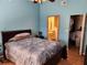 Main bedroom with a double bed and en-suite bathroom access at 3566 Red Pontiac Dr, Port Orange, FL 32129