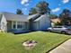 Charming single-Gathering home with attached garage and well-maintained lawn at 3566 Red Pontiac Dr, Port Orange, FL 32129