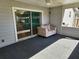 Relaxing screened porch with sliding glass doors and comfy seating at 3566 Red Pontiac Dr, Port Orange, FL 32129