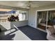 Bright screened porch offers access to the backyard at 3566 Red Pontiac Dr, Port Orange, FL 32129