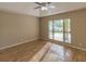 Bright bedroom with large window and hardwood floors at 3605 Galway Ln, Ormond Beach, FL 32174