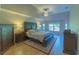 Main bedroom with hardwood floors and ample space for furniture at 3605 Galway Ln, Ormond Beach, FL 32174