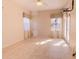 Well-lit bedroom with tile floors, a ceiling fan, and a door that leads to the exterior at 419 Still Forest Ter, Sanford, FL 32771