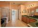 Elegant bathroom features dual sinks, a separate shower, and a walk-in closet, providing a luxurious retreat at 419 Still Forest Ter, Sanford, FL 32771