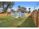 House exterior and fenced backyard at 448 E Church St, Deland, FL 32724