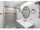 Updated bathroom with walk-in shower and modern vanity at 448 E Church St, Deland, FL 32724