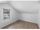 Small bedroom with carpet and window at 448 E Church St, Deland, FL 32724