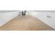 Long bonus room with carpet and access to lower level at 448 E Church St, Deland, FL 32724