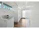 Laundry room with washer, dryer, and stained glass window at 448 E Church St, Deland, FL 32724