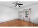 Spacious living area with hardwood floors and fireplace at 448 E Church St, Deland, FL 32724