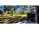 Spacious backyard with shed and mature trees at 487 Dawnview Sq, Port Orange, FL 32127