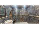 Elegant bathroom featuring a large walk-in shower and marble tile at 487 Dawnview Sq, Port Orange, FL 32127