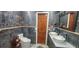 Bathroom with dual sinks, modern vanity, and a large mirror at 487 Dawnview Sq, Port Orange, FL 32127
