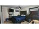 Second bedroom with a large bed, TV, and a view of the outside at 487 Dawnview Sq, Port Orange, FL 32127