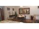 Bright dining area with a table and chairs, complemented by a large mirror and tasteful decor at 487 Dawnview Sq, Port Orange, FL 32127