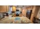 Updated kitchen boasts granite countertops and ample cabinetry at 487 Dawnview Sq, Port Orange, FL 32127