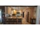 Modern kitchen with granite countertops and stainless steel appliances at 487 Dawnview Sq, Port Orange, FL 32127