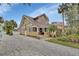 Two-story craftsman home with paved driveway at 511 W Minnesota Ave, Deland, FL 32720