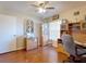 Office space or bedroom featuring hardwood floors and a workstation with extra storage at 55 Fairway Dr # 3D, Debary, FL 32713