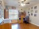 Bright office space with wood flooring, a ceiling fan, and natural light at 55 Fairway Dr # 3D, Debary, FL 32713