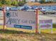Sign for Glen Abbey Golf Club welcomes the public, pointing the way to the entrance of the golf course at 55 Fairway Dr # 3D, Debary, FL 32713