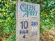 Close-up of the Glen Abbey Golf Club tee marker, showing the hole number, par, and yardage information at 55 Fairway Dr # 3D, Debary, FL 32713