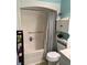 Bathroom with tub shower, toilet, and vanity at 575 Lantern Ln, Orange City, FL 32763