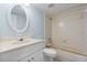 Clean bathroom with tub and white vanity at 689 Wellington Station Blvd # 41, Ormond Beach, FL 32174