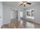Bedroom with mirrored closet doors and window at 689 Wellington Station Blvd # 41, Ormond Beach, FL 32174