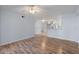 Spacious living room featuring wood-look floors and high ceilings at 689 Wellington Station Blvd # 41, Ormond Beach, FL 32174