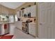 Modern kitchen with stainless steel appliances and white cabinets at 713 Powderhorn Cir, Lake Mary, FL 32746