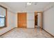 Spacious bedroom with wood closet doors and carpet at 783 S Atmore Cir, Deltona, FL 32725