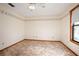 Bright bedroom featuring carpet and a window at 783 S Atmore Cir, Deltona, FL 32725