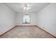 Bright bedroom with window, ceiling fan and carpet at 783 S Atmore Cir, Deltona, FL 32725
