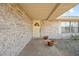 Front entry with brick walkway and potted plants at 783 S Atmore Cir, Deltona, FL 32725