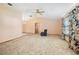 Spacious living room with carpeted floors and ceiling fan at 783 S Atmore Cir, Deltona, FL 32725