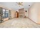 Living room with brick fireplace and carpeted floor at 783 S Atmore Cir, Deltona, FL 32725