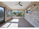 Screened porch with ceiling fan and brick walls at 783 S Atmore Cir, Deltona, FL 32725