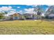 Brick house with a well-maintained lawn at 980 E Pennsylvania Ave, Deland, FL 32724