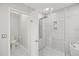 Nicely updated bathroom featuring a walk in shower, tub and toilet at 10025 Scottish Pines Ct, Orlando, FL 32832