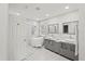 Spa-like bathroom with dual vanities, soaking tub, and shower at 10025 Scottish Pines Ct, Orlando, FL 32832