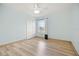 Light blue bedroom with ceiling fan and window at 10025 Scottish Pines Ct, Orlando, FL 32832