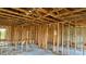 Under construction interior, showing the structural framing and open floor plan at 1019 Beulah Dr, Edgewater, FL 32132